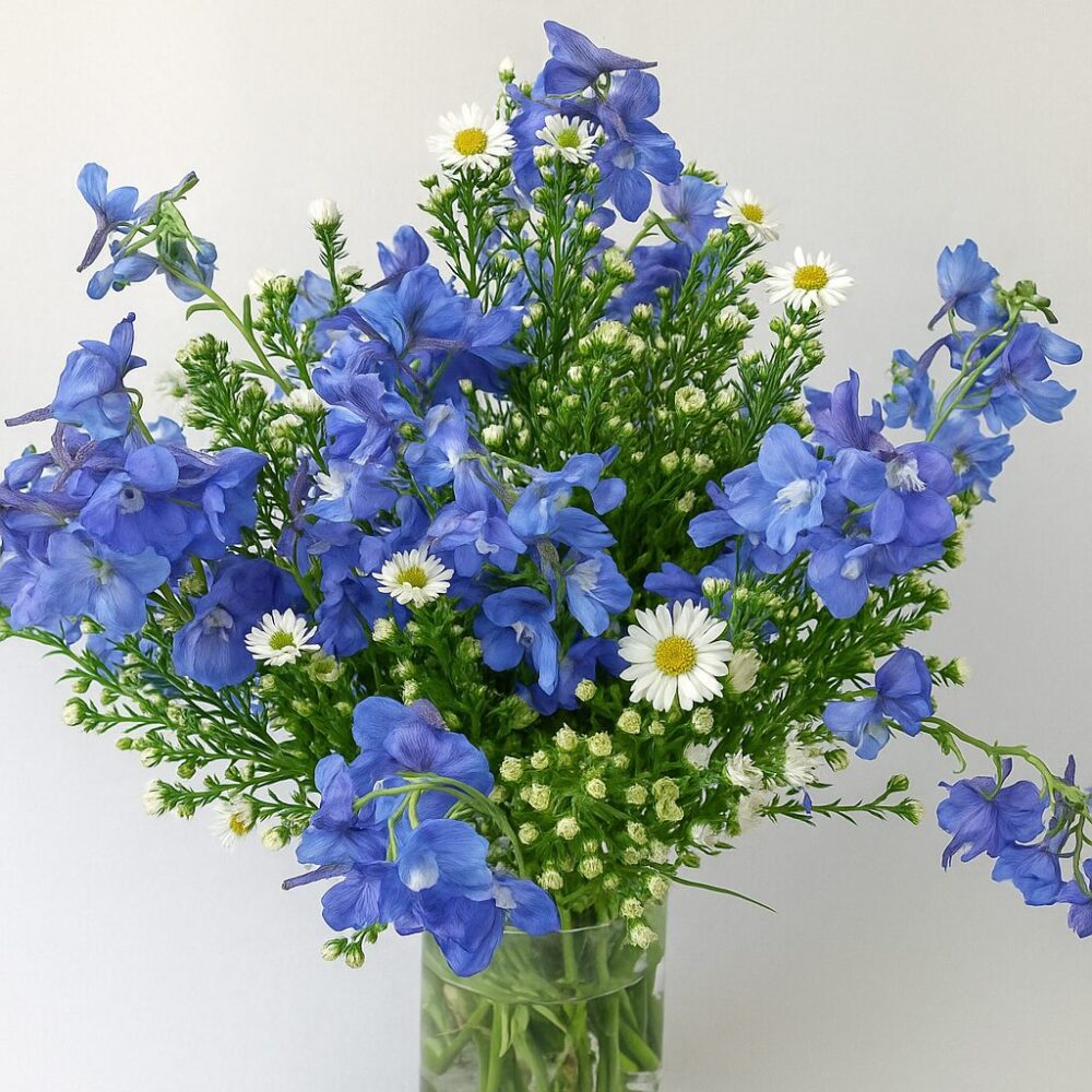 wedding centerpiece blue sky wedding centerpiece blue sky 20250619 1226 flores azules realistas remix 01jy4kj3hqes6rj9dddcs4vf2x