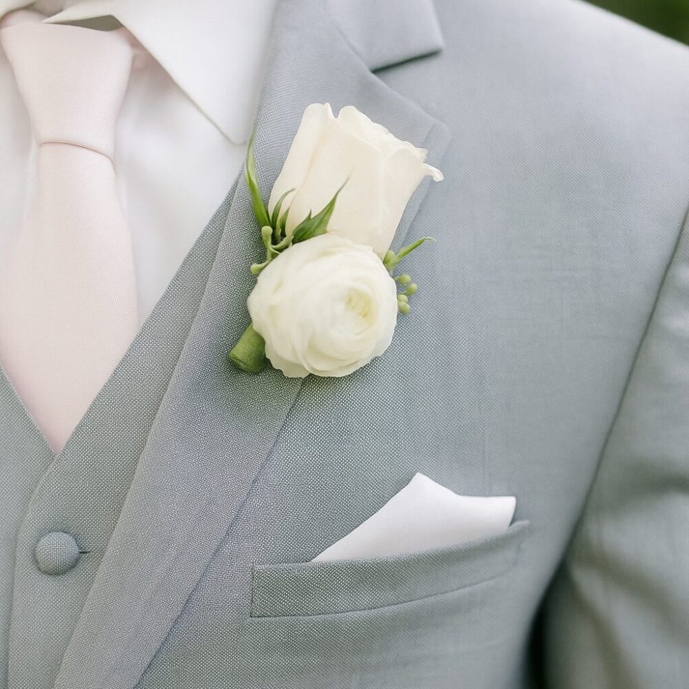 boutonniere carmen c boutonniere carmen c 20250703 1010 elegant suit detail remix 01jz8d70mvfgcszw0fbrhzwngg
